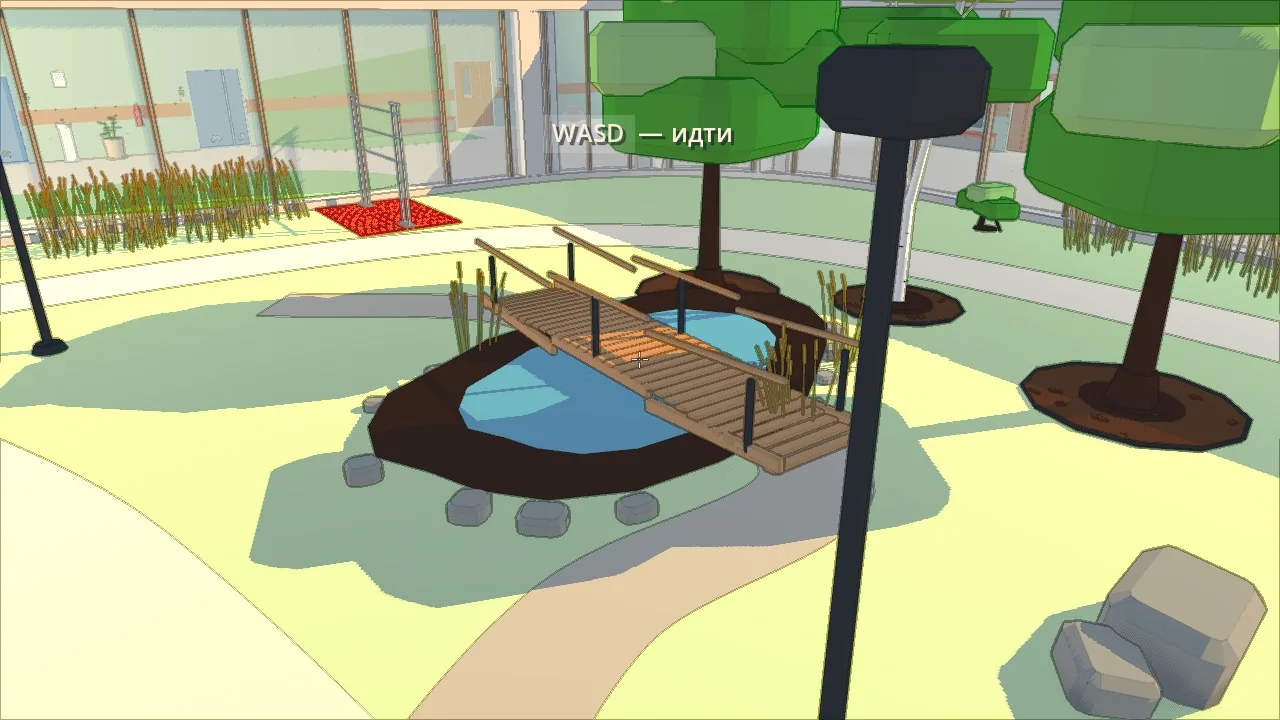 The pond with a footbridge and reeds, a pull-up bar behind it