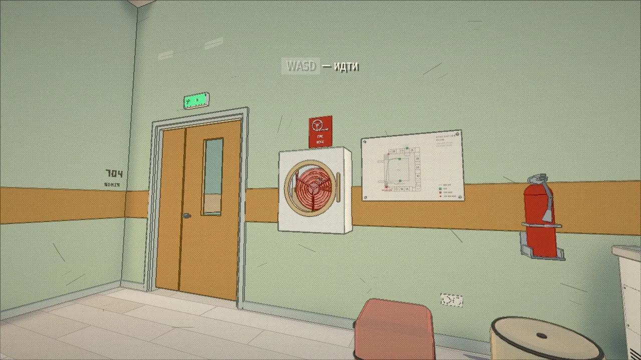 The corridor by the stairs: an "Exit" sign, a cabinet, a plan and an extinguisher